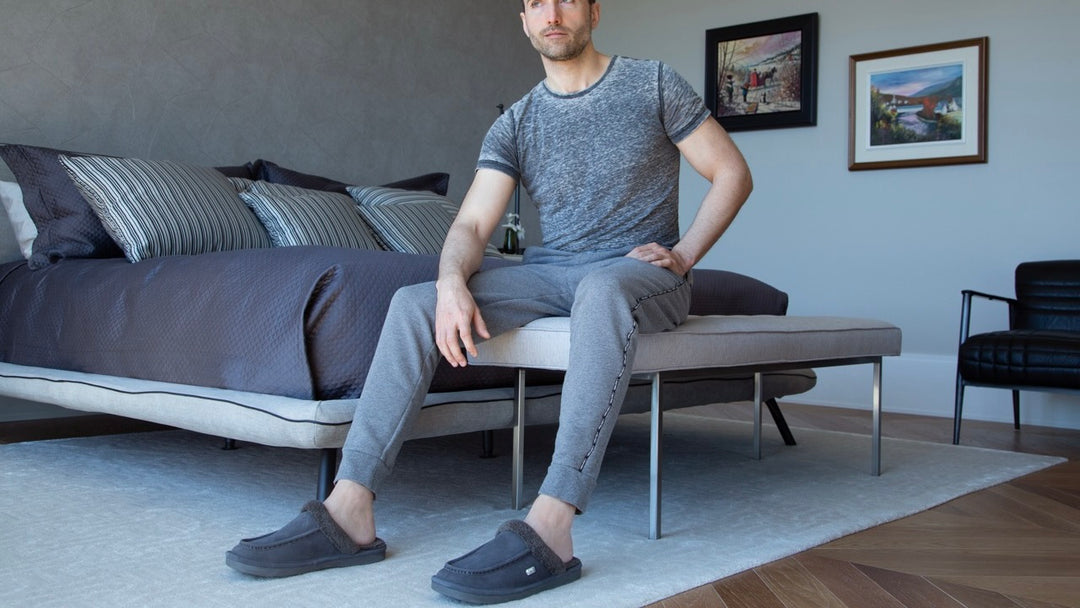 Man enjoying cozy Nuknuuk slippers